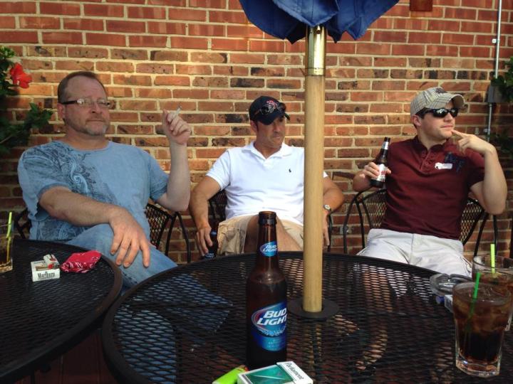 guys on patio at Club David