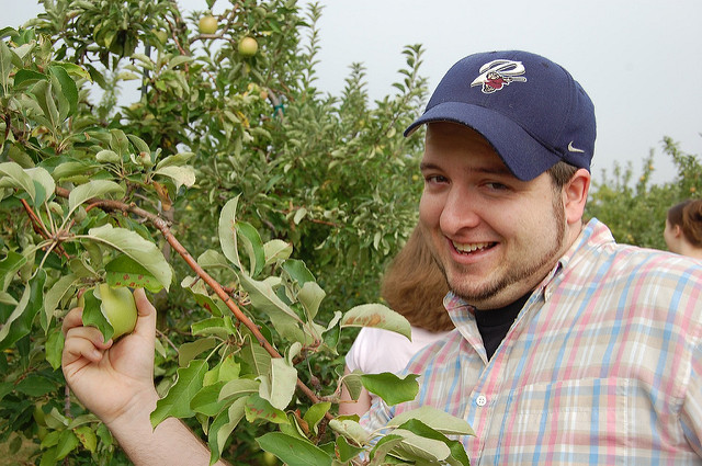 guy picking apple