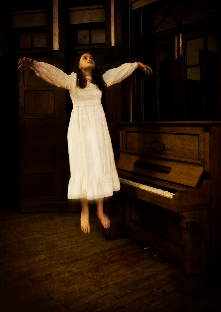 hovering girl at piano