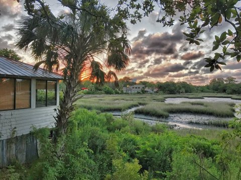 You'll Love Lounging Under The Oak Trees At This Creekside Restaurant In Florida