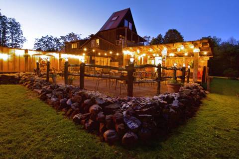 There's A Delicious Steakhouse Hiding Inside This Old New York Barn That's Begging For A Visit