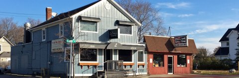 The Humble Riverside Pub In Michigan That Will Welcome You Like Family