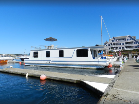 Spend The Night On The Water In This Wonderfully Cool Houseboat In Maine