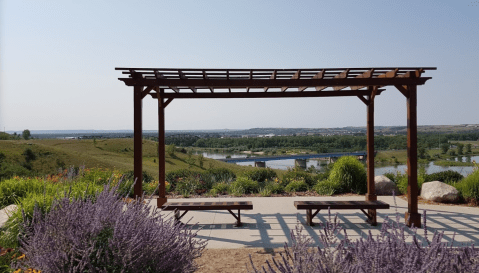 Enjoy Bridges, A River, And Beautiful Views At Chief Looking's Village Park In North Dakota