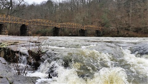 The Breathtaking Alabama Park That Lets You Walk Across A Waterfall