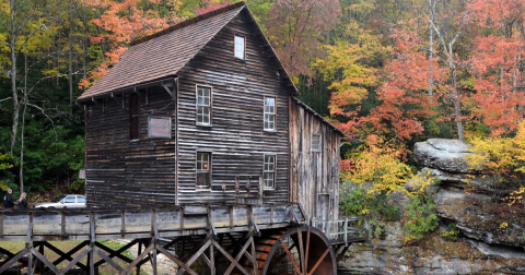 The Glade Creek Falls In West Virginia Is Surrounded By Beautiful Fall Colors