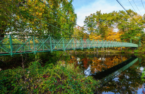 Walk Across A 275-Foot Suspension Bridge Near Milford Oval In New Hampshire