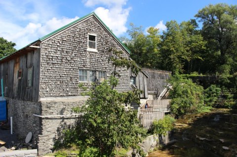 Feast On Cider Donuts And Slushies In Front Of A Waterfall At Burrville Cider Mill In New York