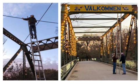 Stroll Down The Beautifully Decorated Välkommen Trail In Kansas, Complete With A Bridge Covered In Holiday Lights