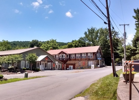 Enjoy Homemade Cider And BBQ Inside An Authentic 1840s Log Cabin When You Visit Wild Hare Cider In Virginia