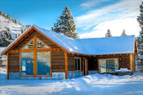 Enjoy A Relaxing Soak Under The Stars In A Cozy Montana Cabin's Brand-New Outdoor Hot Tub