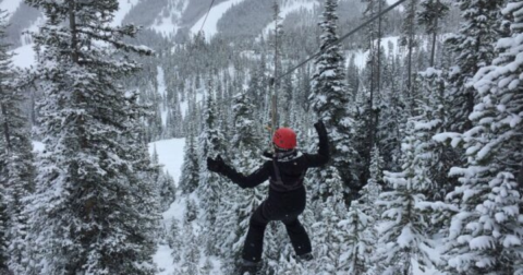 Fly Through The Frosty Air While Marveling At The Frozen Landscape On Montana's Winter Zipline Adventure