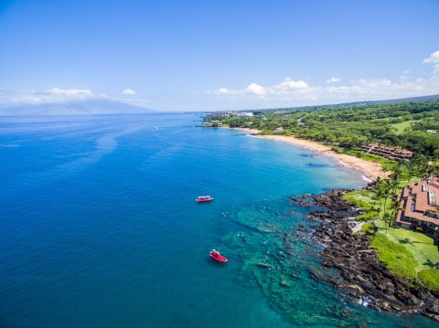 Explore Lava Flows And Underwater Grottos On A Tour With Redline Rafting In Hawaii