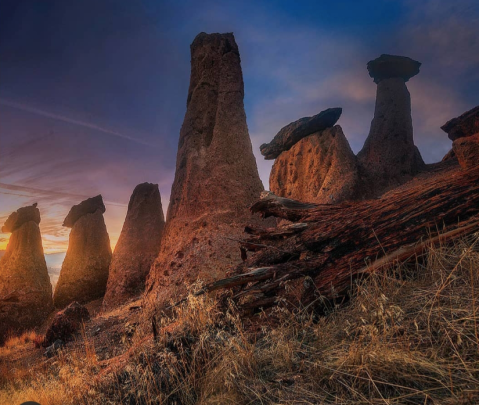 The Metolius Balancing Rocks Are Perched On A Mountain Overlooking A Beautiful Oregon Lake