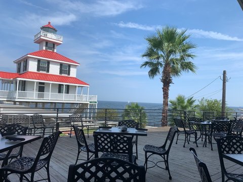 Enjoy A Sunset Over The Water At Landry's Seafood House In New Orleans