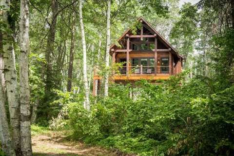 Sleep High Up In The Forest Canopy At Crosslake Treetop Village In Minnesota