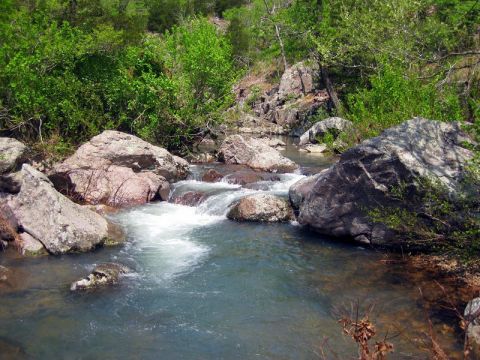 The Remote Hike To Bluffs In Missouri Winds Through A Wooded Area And Past A Waterfall