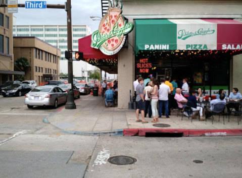 The Pizza At Schlittz & Giggles In Louisiana Is Bigger Than The Table