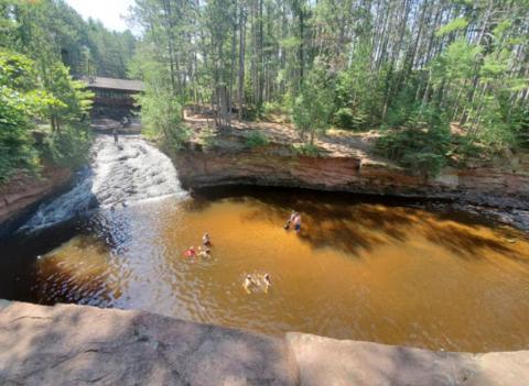 Swim Underneath A Waterfall At This Refreshing Natural Pool In Wisconsin