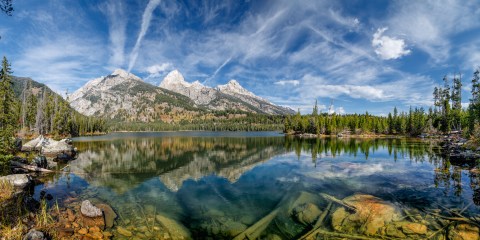 Nestled In The Wyoming Mountains, Taggart Lake Has Some Of The Clearest Water In The State