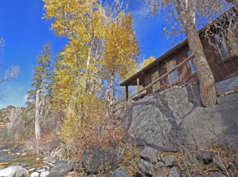 Stay In This Cozy Little Creekside Cabin In Colorado For Less Than $111 Per Night