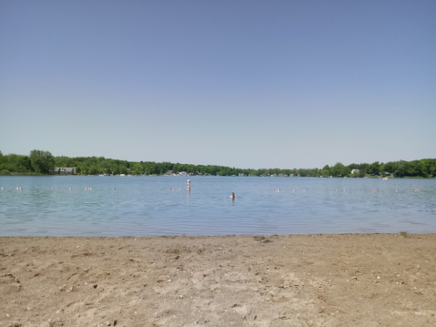 Sink Your Toes In The Sand At Clover Beach, One Of The Most Pristine And Beautiful Beaches Near Detroit