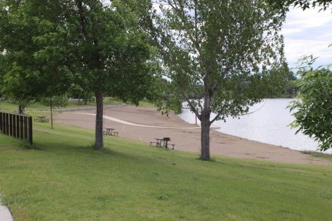 Wade In The Refreshing Waters On The Scenic Beach At Lake Elmo In Montana