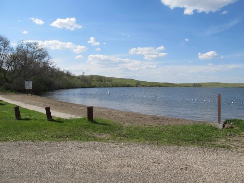 Soak Up Some Sun While Enjoying A Quiet Day At The Lake In North Dakota's Beaver Lake State Park