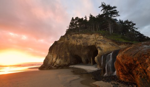 Wade In The Refreshing Waters On The Scenic Beach At Hug Point Falls In Oregon