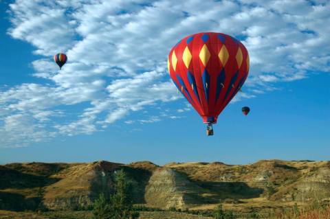 Witness Hot Air Balloons Floating Over The North Dakota Badlands During This Annual Event