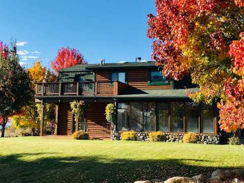 Experience The Fall Colors Like Never Before With A Stay At This Cozy Log Home In Nevada