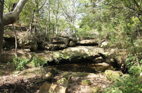 A Junkyard Turned Into A Local Waterfall Hideout At The Hollow In Kansas