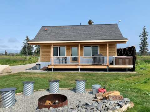 Soak In Your Own Private Hot Tub With Volcano Views In This Alaskan Cabin