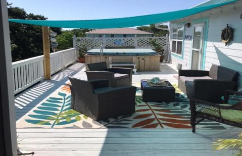 Enjoy Your Own Hot Tub, Game Room, And Tiki Bar At The Island House In Mississippi