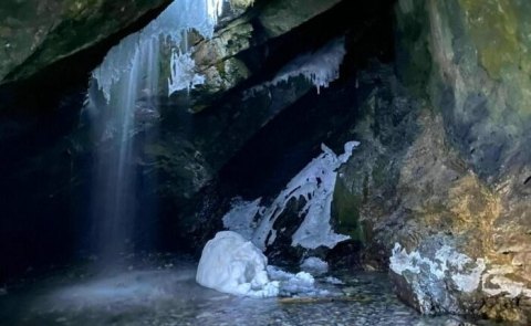 This Snowy Utah Trail Leads You To A Cave With A Frozen Waterfall