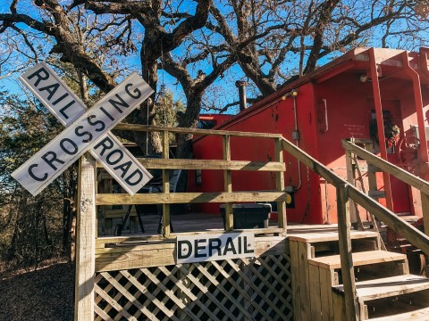 Stay Overnight In A Train Caboose At River of Love Cabins, Nestled Near The Bend Of Red River In Oklahoma