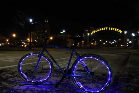 Take A Lighted Bike Tour Through Downtown Beaumont With Spindletop Cruisers In Texas