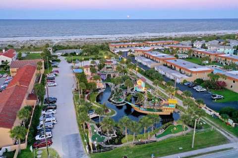 Fiesta Falls Mini Golf In Florida Offers Beach Views, Waterfalls, & A Spanish Ship Replica