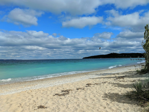 This Hidden Beach In Michigan Has Some Of The Bluest Water In The State