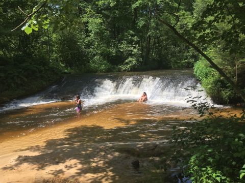 Hike Less Than Two Miles To This Spectacular Waterfall Swimming Hole In Wisconsin