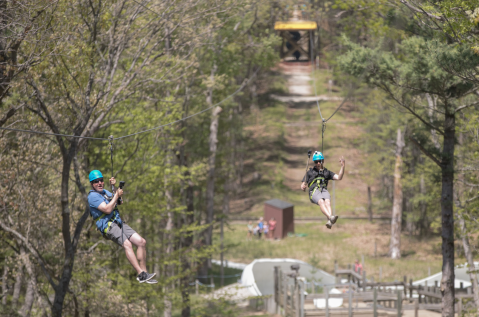 This New 1,400-Foot Dual Zip Line In Michigan Lets You Fly Through The Sky With A Friend In Tow