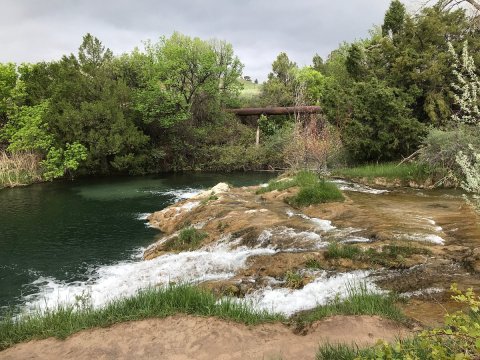 Hike Less Than A Quarter Mile To This Spectacular Waterfall Swimming Hole In South Dakota