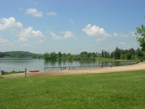 Wade In The Refreshing Waters On The Scenic Beach At Shawnee State Park In Pennsylvania