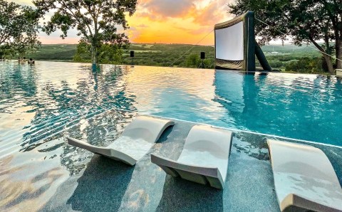 Watch Movies While Splashing Around In An Infinity Pool Overlooking The Texas Hill Country This Summer