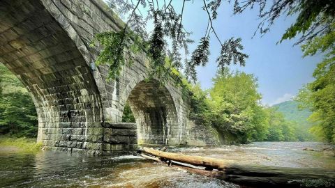 The One-Of-A-Kind Trail In Massachusetts With Arched Bridges And A River Is Quite The Hike