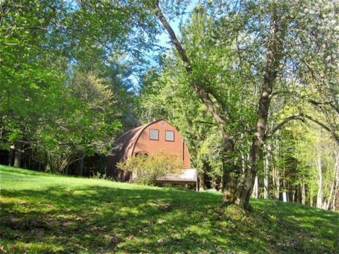 Escape To A Secluded West Virginia Cabin Complete With A Private Beach And A Stocked Pond