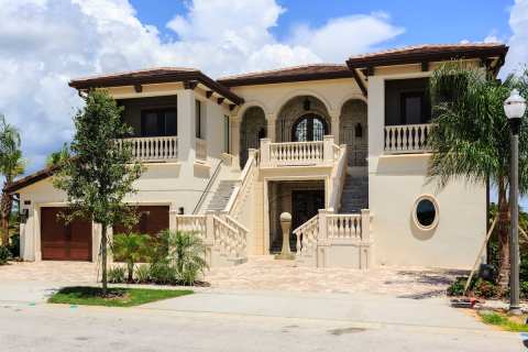 This Luxury Airbnb In Florida Has An Indoor Basketball Court, Private Bowling Alley, & So Much More