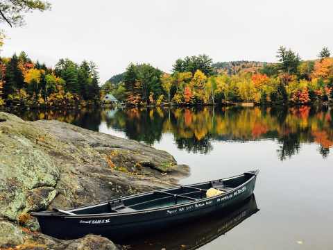 This Lodge Airbnb In New Hampshire Comes With Its Own Hot Tub, Beach, And Dock