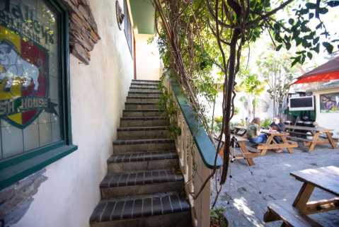 This Walk-Up Airbnb in Southern California Comes With Its Own Private Entrance from the Patio of an Irish Pub