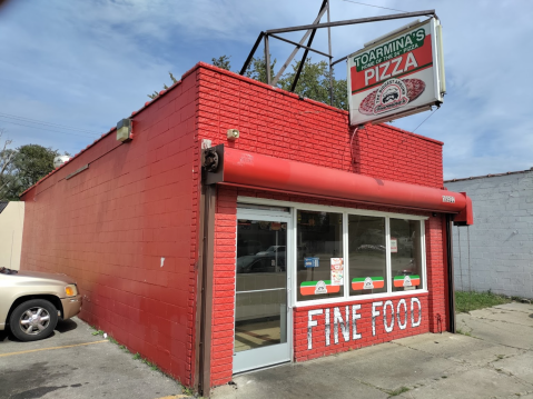 The Pizza At This Delicious Detroit Eatery Is Bigger Than The Table